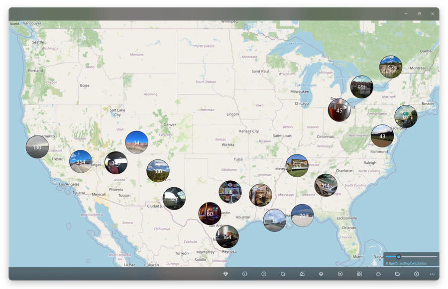 GeoPhoto travel memories grouped as photo clusters across a map